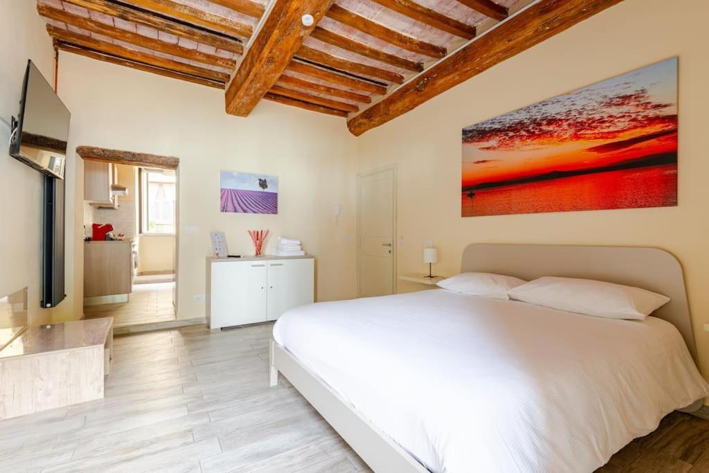 The View - Sunset & Relax - Suite - Appartamenti Vista Lago ปัสซีญาโน ซุล ตราซีเมโน ภายนอก รูปภาพ